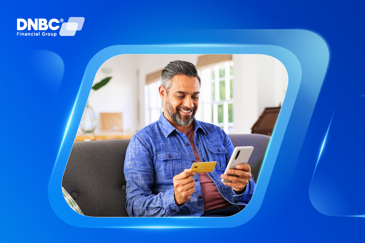 Happy person checking their Australia BSB Number on a smartphone banking app, demonstrating how easy it is to find bank details with DNBC.