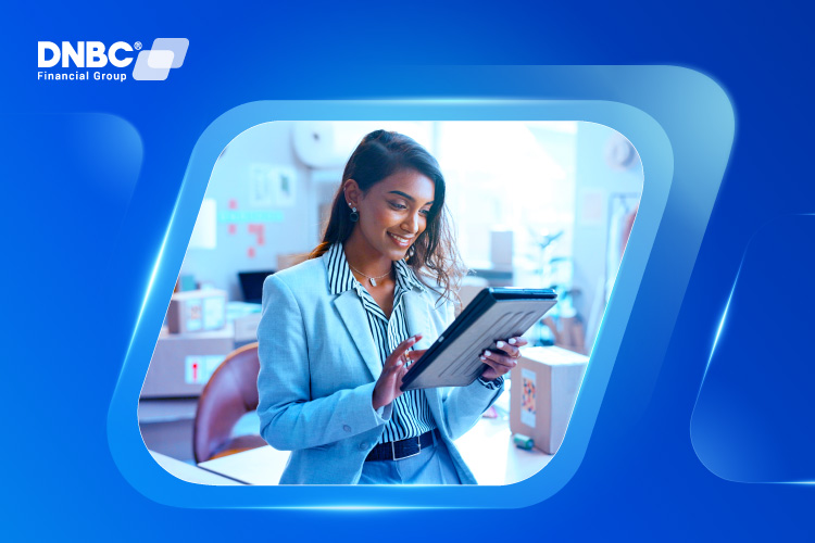 Smiling business user making a SEPA transfer using DNBC's online account.