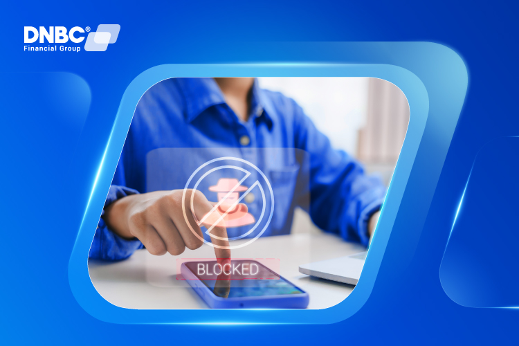 Businessperson interacting with touchscreen graphics labeled “Fraud Prevention,” indicating proactive monitoring and security measures.